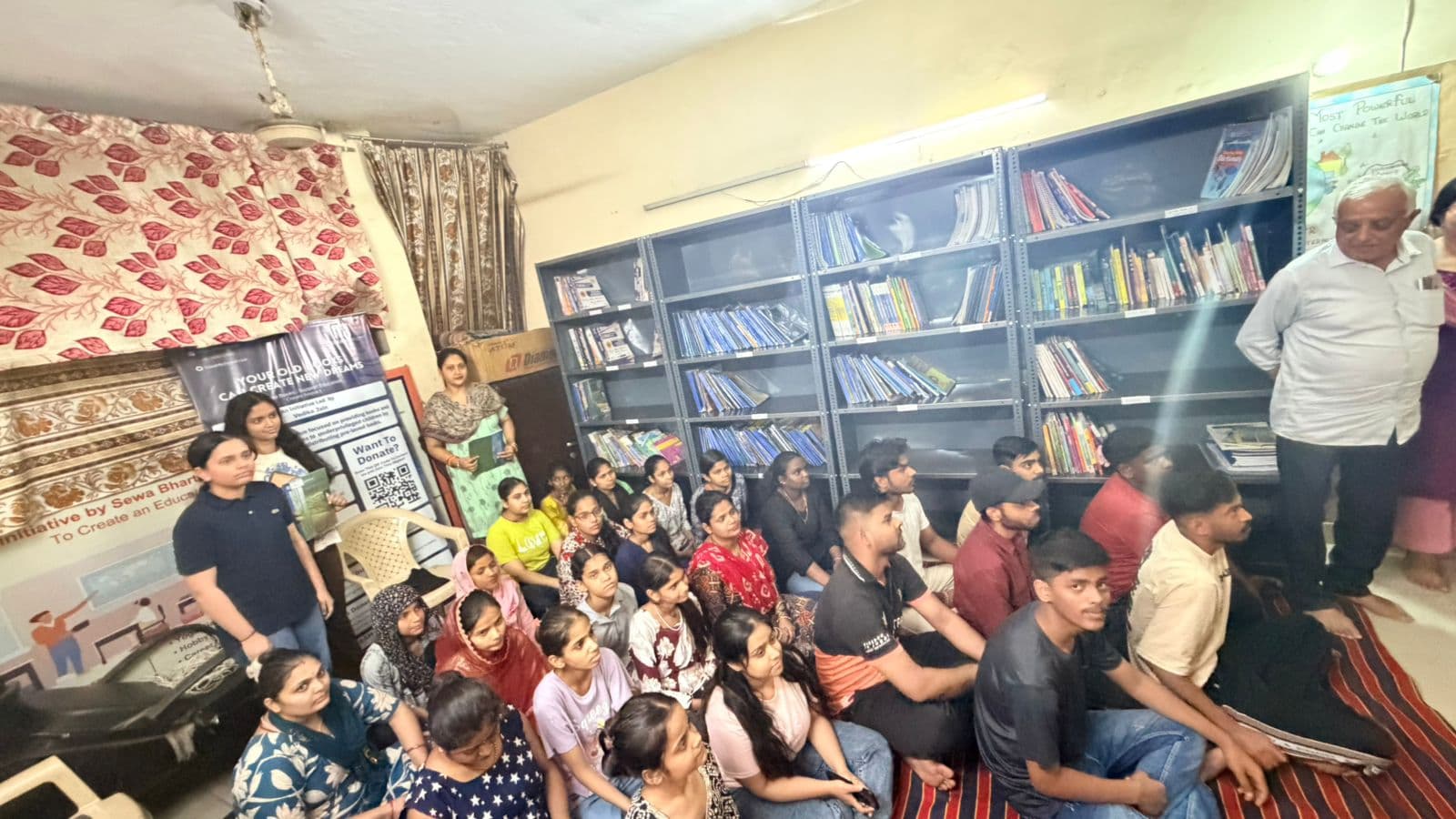 Children reading in Shakurpur Reading Room